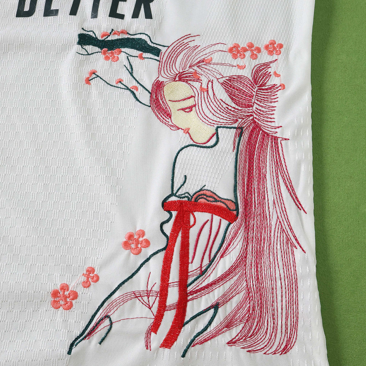Embroidered Home Sakura 26/27 Player Edition Shirt